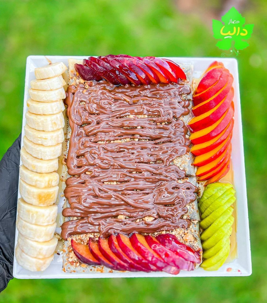 Nutella, honey, nuts, and fruit crepe