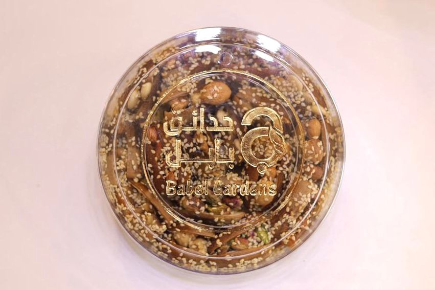 Deglet Nour plate with nuts, sesame, and honey