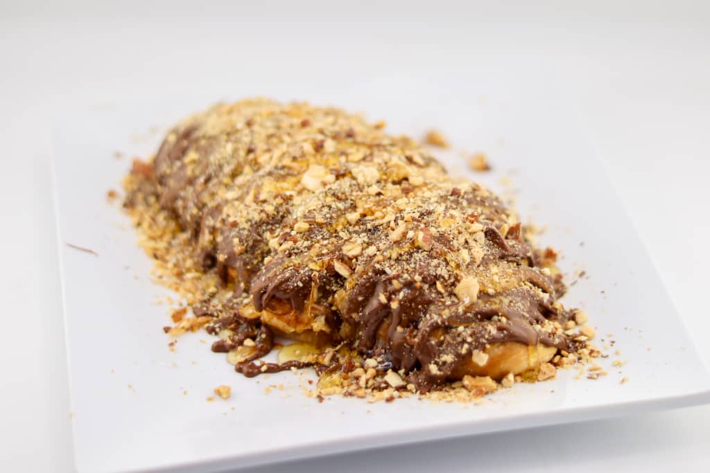Nutella, natural honey, and nuts French brioche