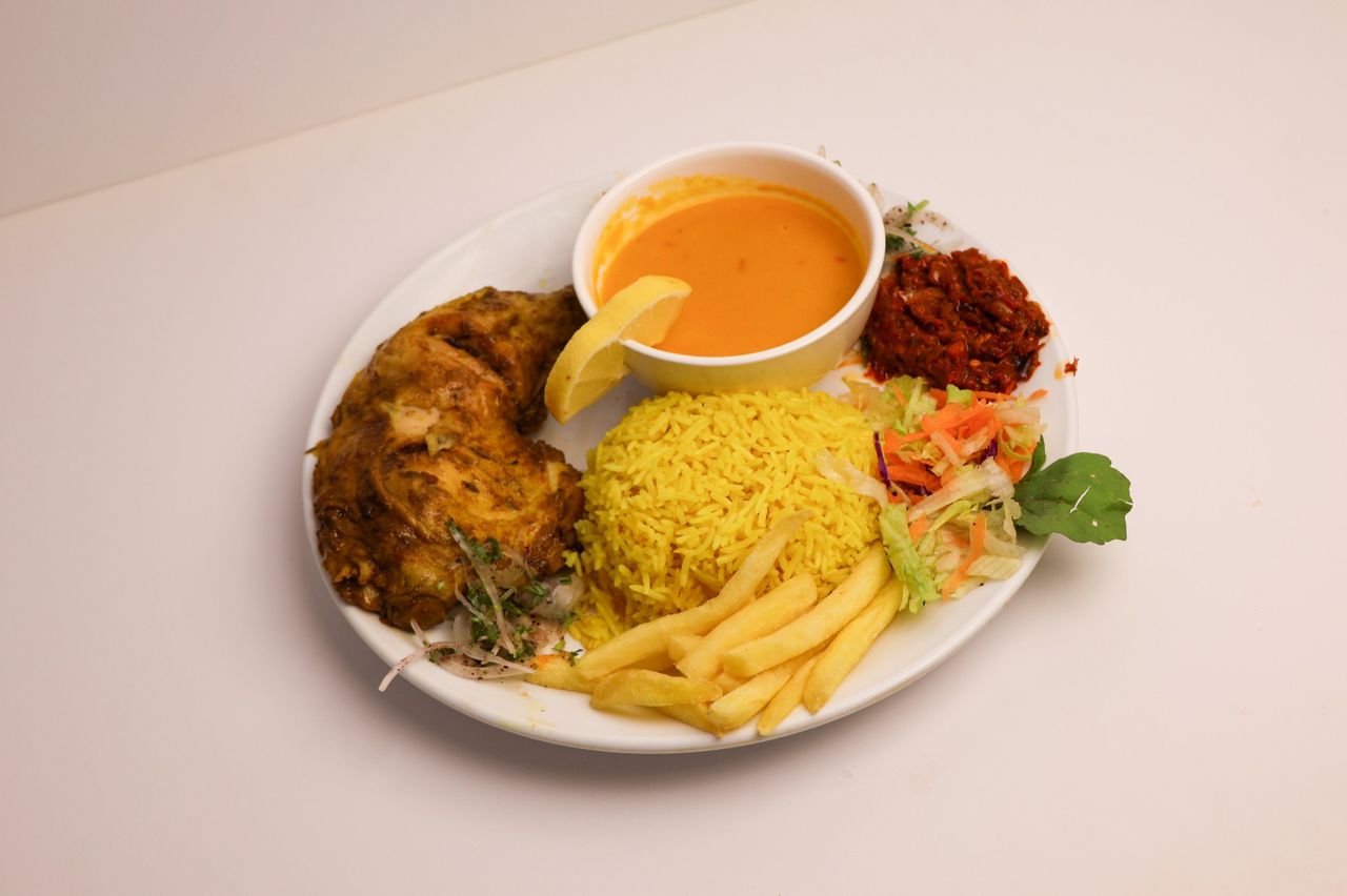 Quarter national chicken boardim meal + mandi rice