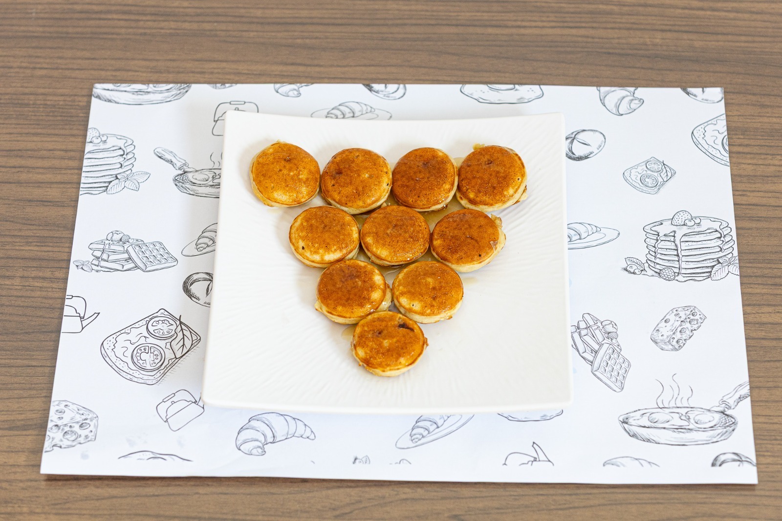 Mini pancake with butter and honey