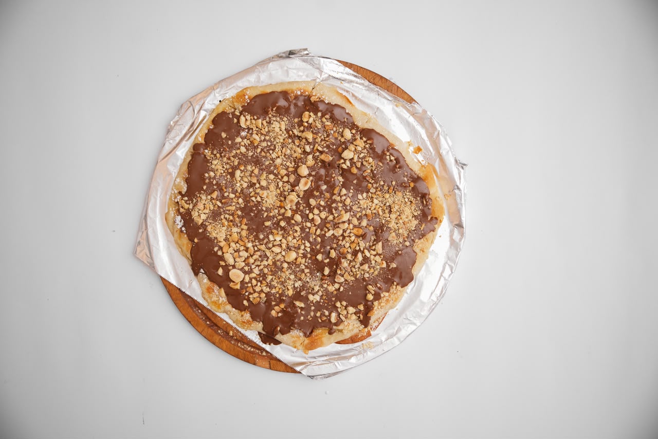 Nutella, nuts, and cream pie