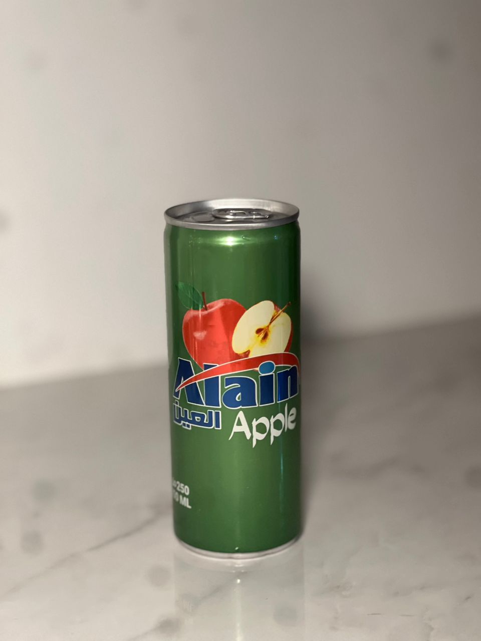 مشروب غازي العين تفاح